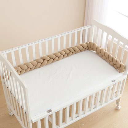 TOUR DE LIT TRESSE brun dans lit de bébé